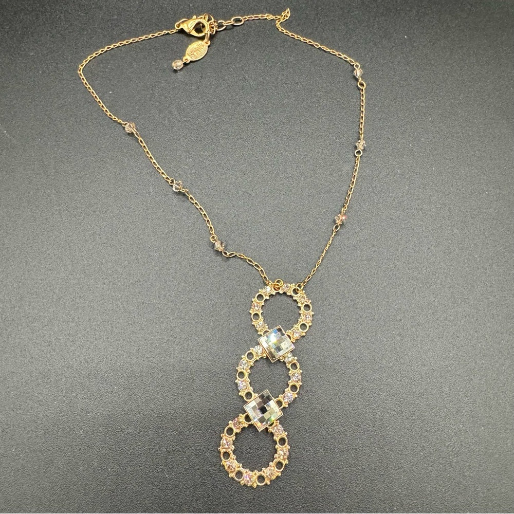 Vintage Belladonna Circular Crystal and Gold Tone Infinity Pendant Necklace