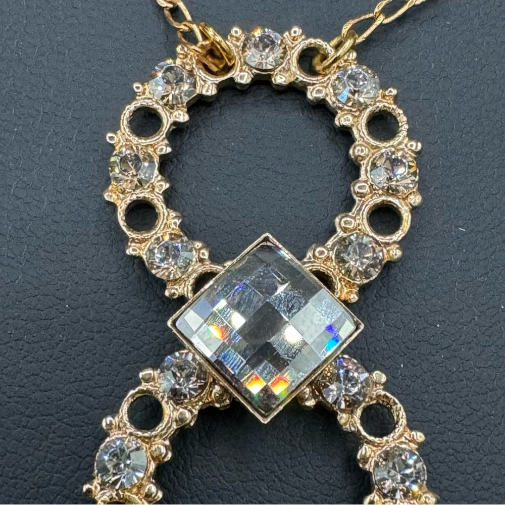 Vintage Belladonna Circular Crystal and Gold Tone Infinity Pendant Necklace