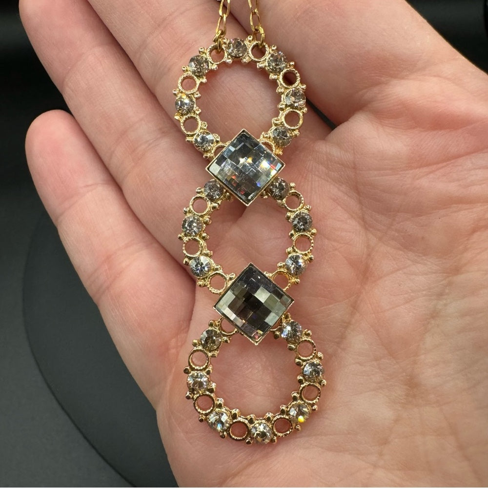 Vintage Belladonna Circular Crystal and Gold Tone Infinity Pendant Necklace