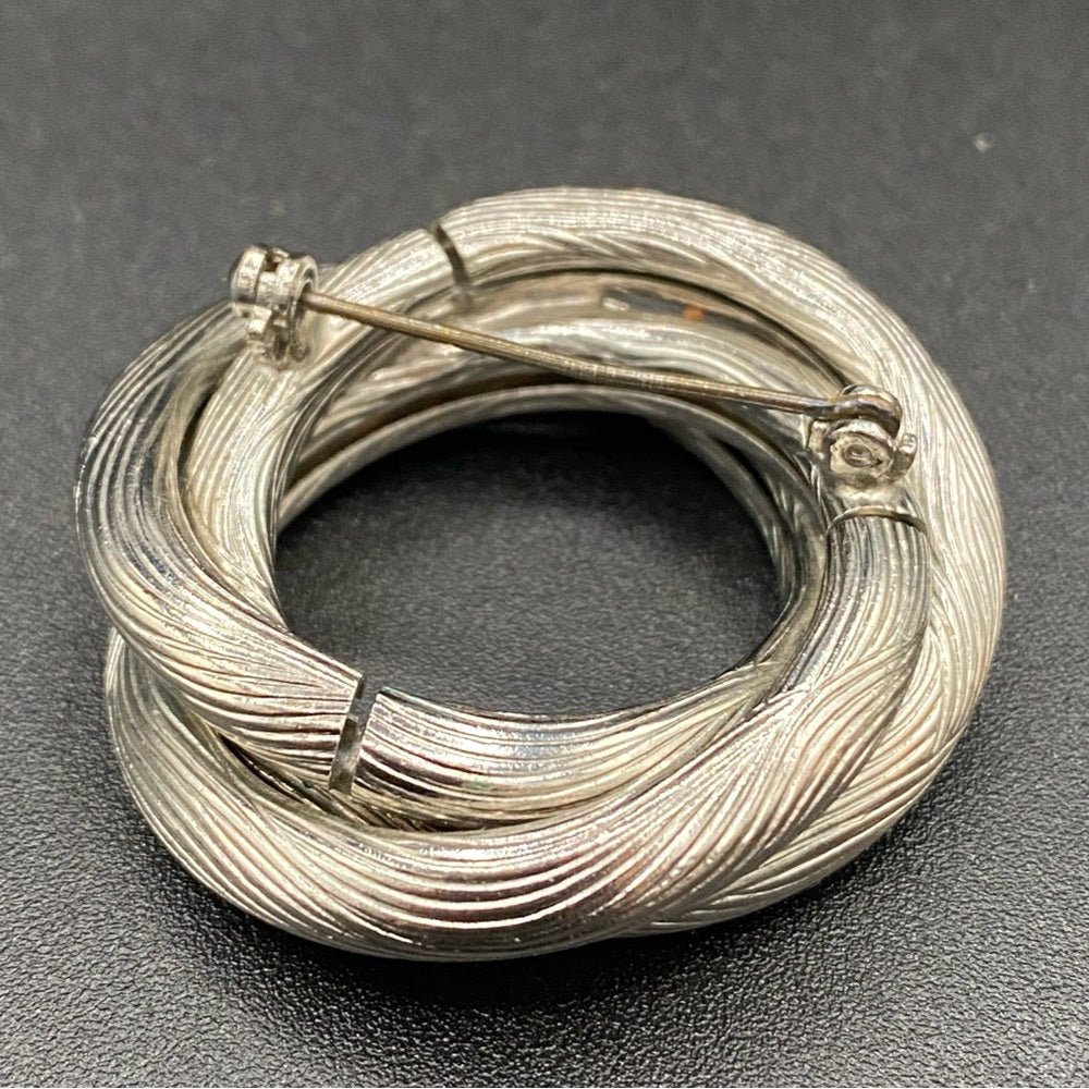 SetsMid-Century Modern Silver Tone Textured Brooch and Clip On Earrings Set