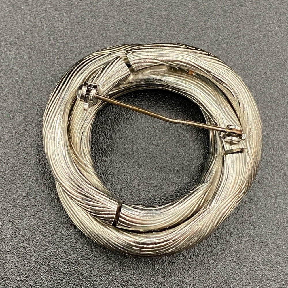 SetsMid-Century Modern Silver Tone Textured Brooch and Clip On Earrings Set