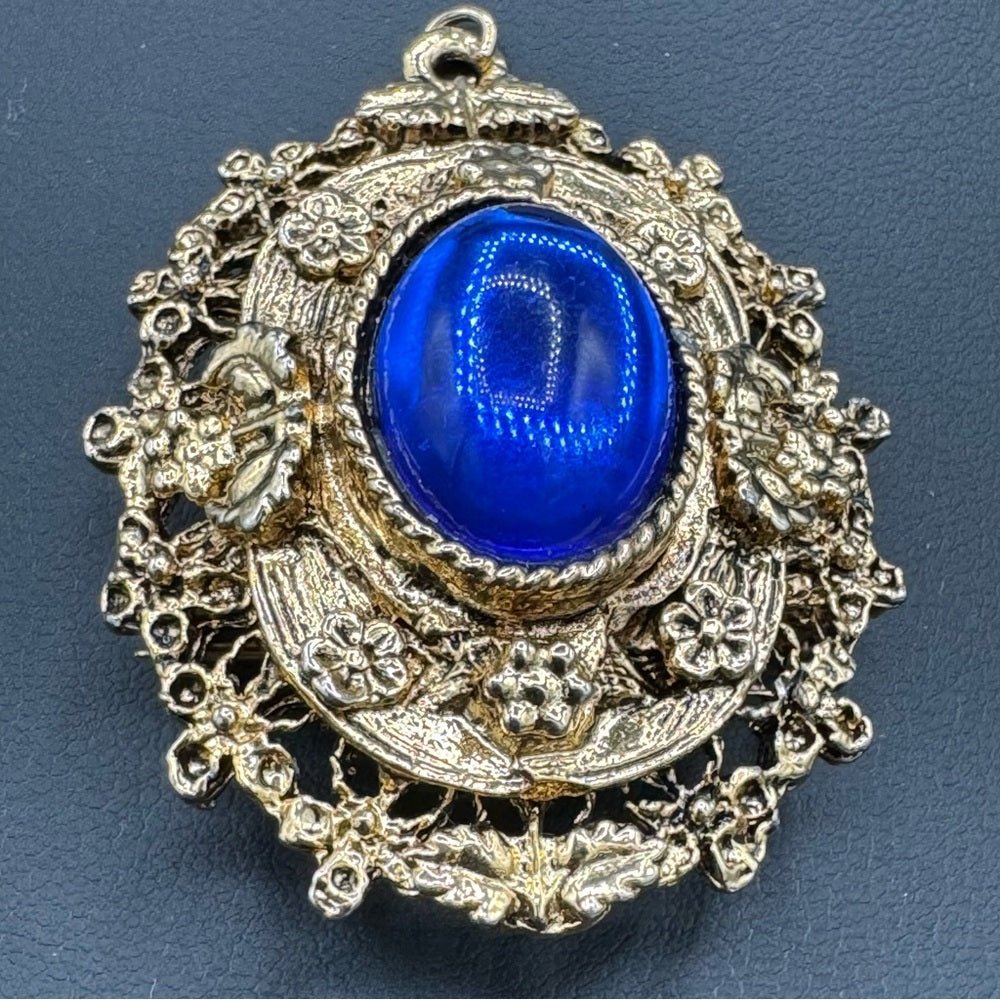 BroochesVictorian Revival Ornate Brooch with Royal Blue Cabochon Centre