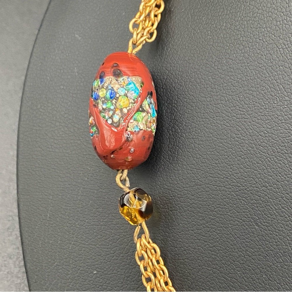 NecklaceVintage Textured Glass Bead Flapper Necklace with Gold Tone Filigree Details
