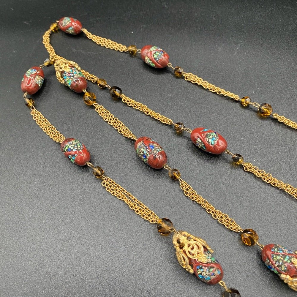 NecklaceVintage Textured Glass Bead Flapper Necklace with Gold Tone Filigree Details