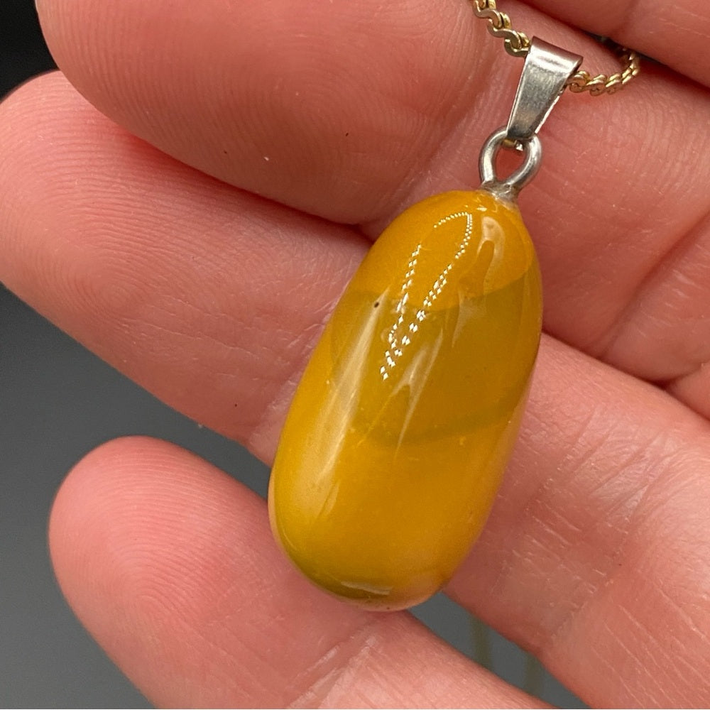 Amber Yellow Colored Pendant on Gold Tone Chain 23in