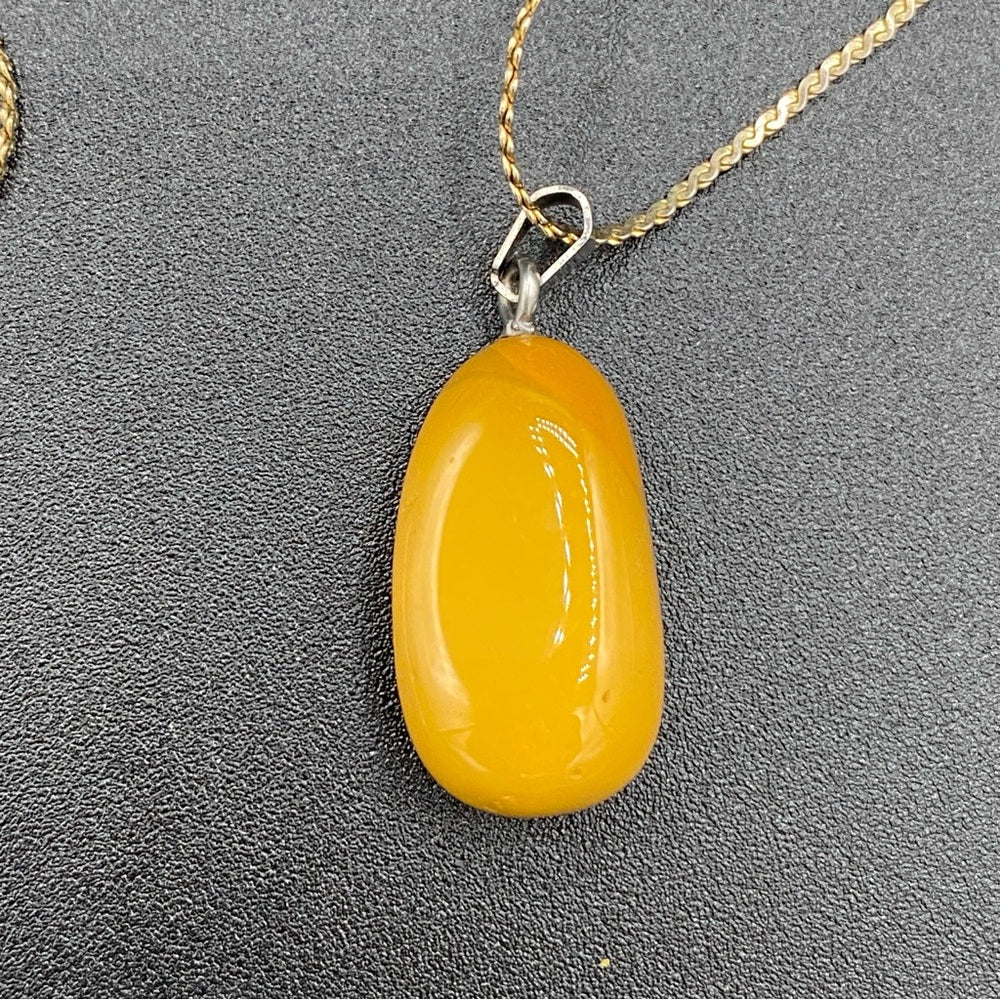 Amber Yellow Colored Pendant on Gold Tone Chain 23in