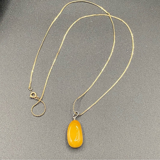 Amber Yellow Colored Pendant on Gold Tone Chain 23in