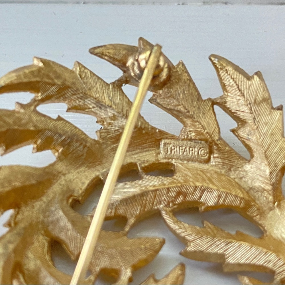 Vintage Crown Trifari Curved Leaf Brooch in Brushed Gold Tone